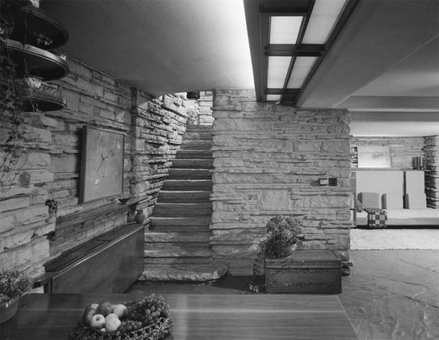 AR: Frank Lloyd Wright TI: Edgar J. Kaufmann House (Fallingwater) TI: interior, main room, dining area, with staircase to second level DT: designed 1935, construction completed 1937 DT: Image: 1963 AA: ARTstor  CN: ASTOLLERIG_10311592820  UR: http://0-library.artstor.org.library2.pima.edu/library/secure/ViewImages?id=8CNHbzYmIyMoIjZUej54RH0lVHMhfw%3D%3D 